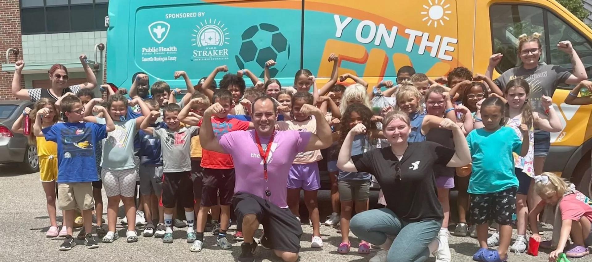 Y On the Fly - Muskingum - Kids and volunteers at the van